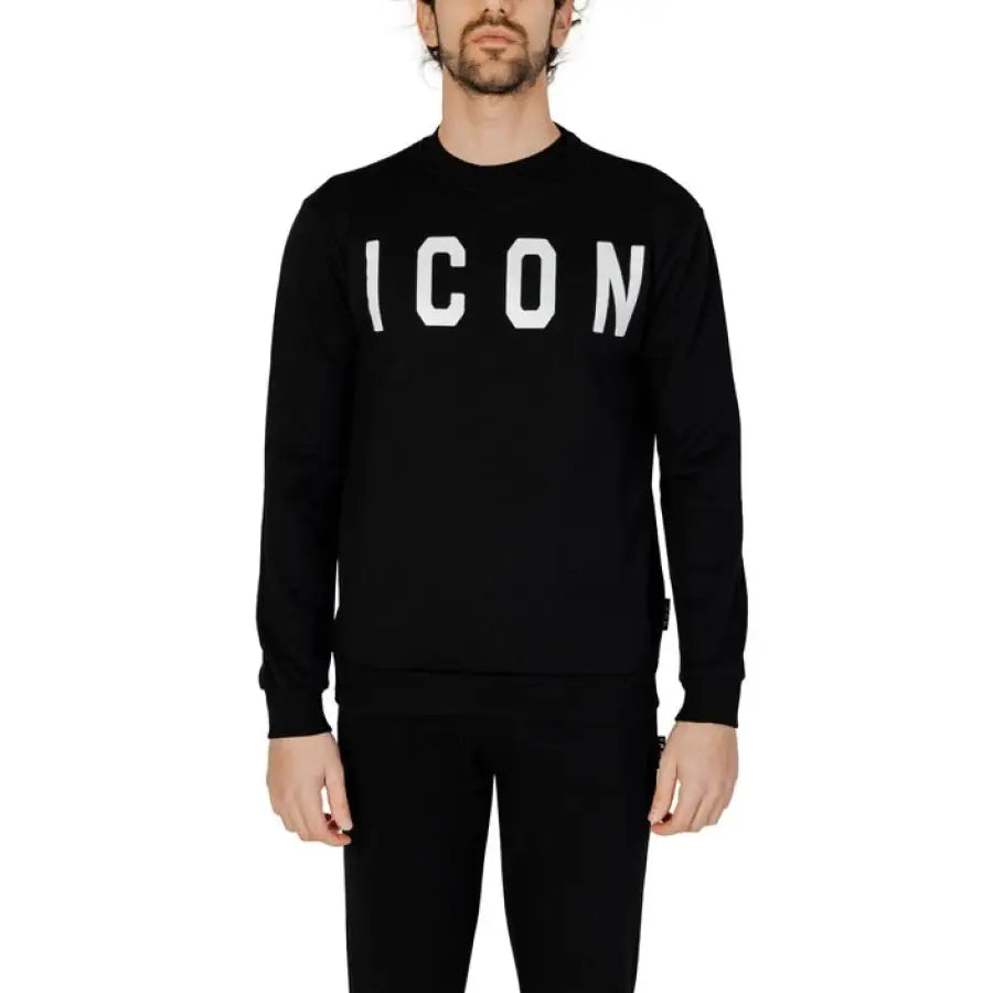 
                      
                        Man in Icon urban style black sweater, perfect for urban city fashion
                      
                    