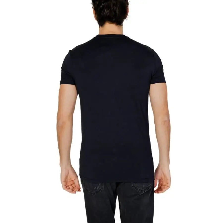 Man in Antony Morato black T-shirt with white logo on back - Antony Morato Men T-Shirt.