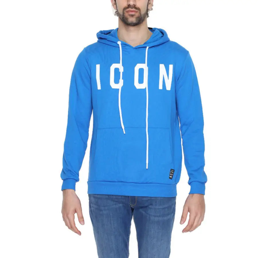 
                      
                        Man in blue Icon hoodie showcasing urban city style clothing
                      
                    