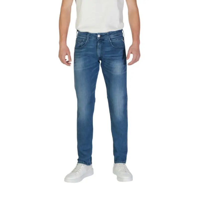 Man wearing Replay Blue Men Trousers Spring Summer with white sneakers