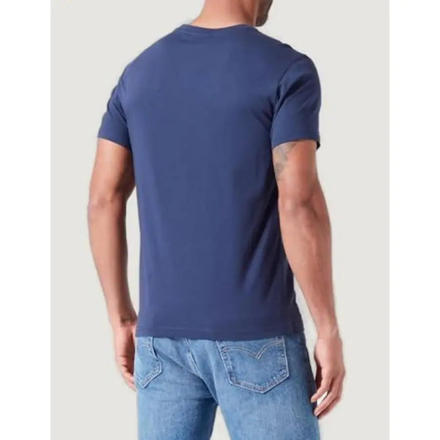 
                      
                        Man wearing blue Emporio Armani Underwear T-Shirt
                      
                    