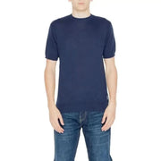 Man wearing Hamaki-ho Men Knitwear: blue t-shirt and jeans