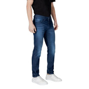 Man in dark wash jeans and white sneakers showcasing Armani Exchange Blue Mens Jeans