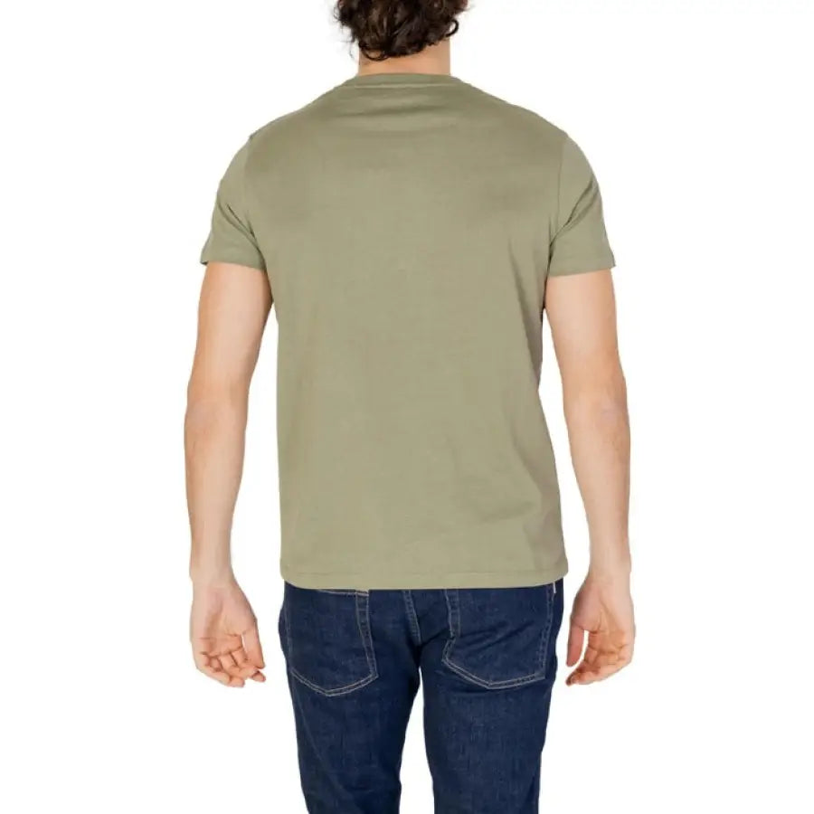 
                      
                        Man in green U.S. Polo Assn. men t-shirt showing urban style clothing
                      
                    