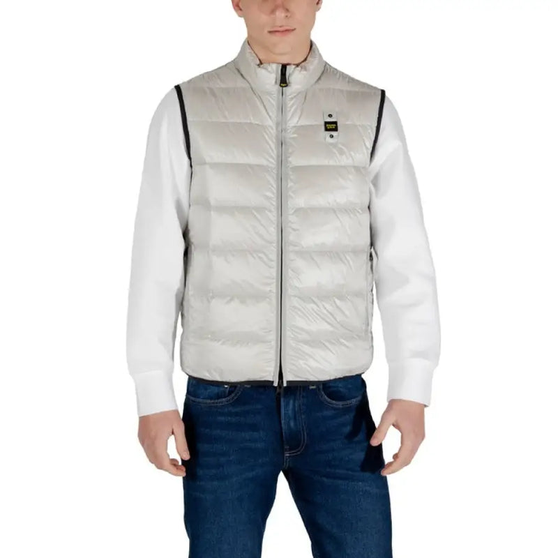 Man modeling a Light Gray Puffer Vest for Men in a stylish outdoor setting