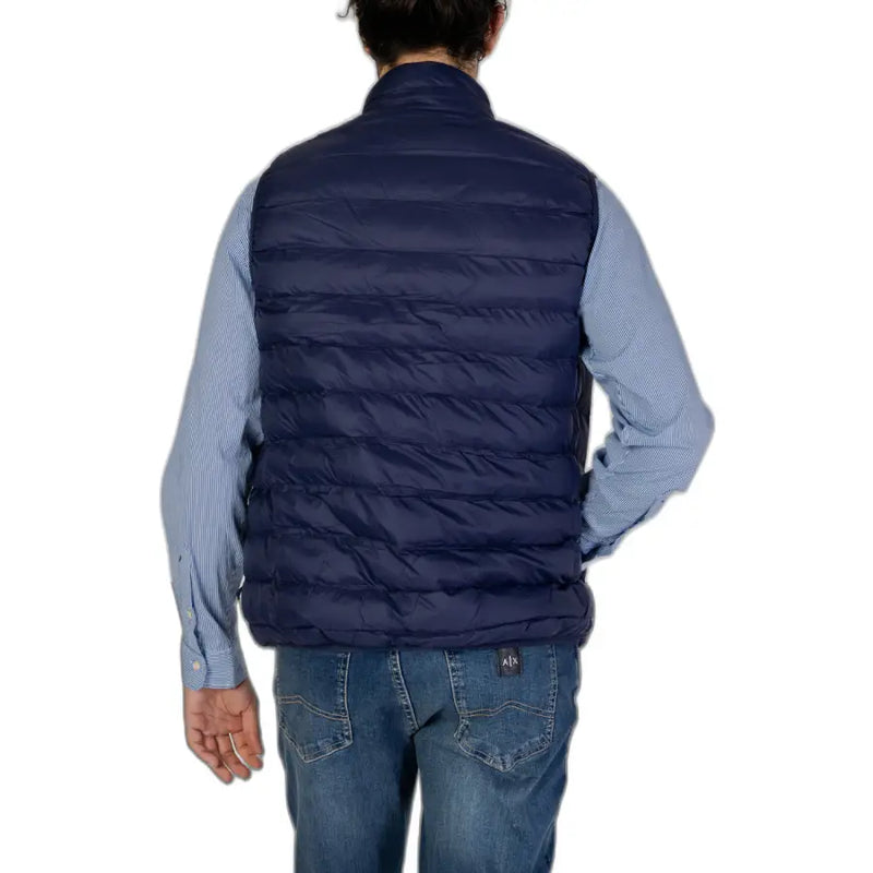 Man wearing a navy blue quilted puffer vest for the Navy Blue Quilted Puffer Vest product image