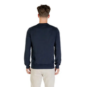 Man wearing navy blue sweater and khaki pants showcasing the Man in Navy Blue Sweater and Khaki Pants product