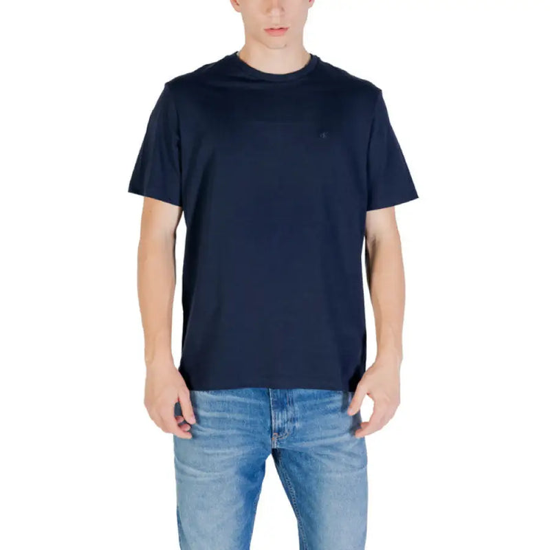 Man wearing navy T-shirt and blue jeans in Men’s Black Short Sleeve T Shirt product image