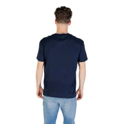 Man wearing a navy blue T shirt and jeans displayed in Tommy Jeans Navy Blue T Shirt product image
