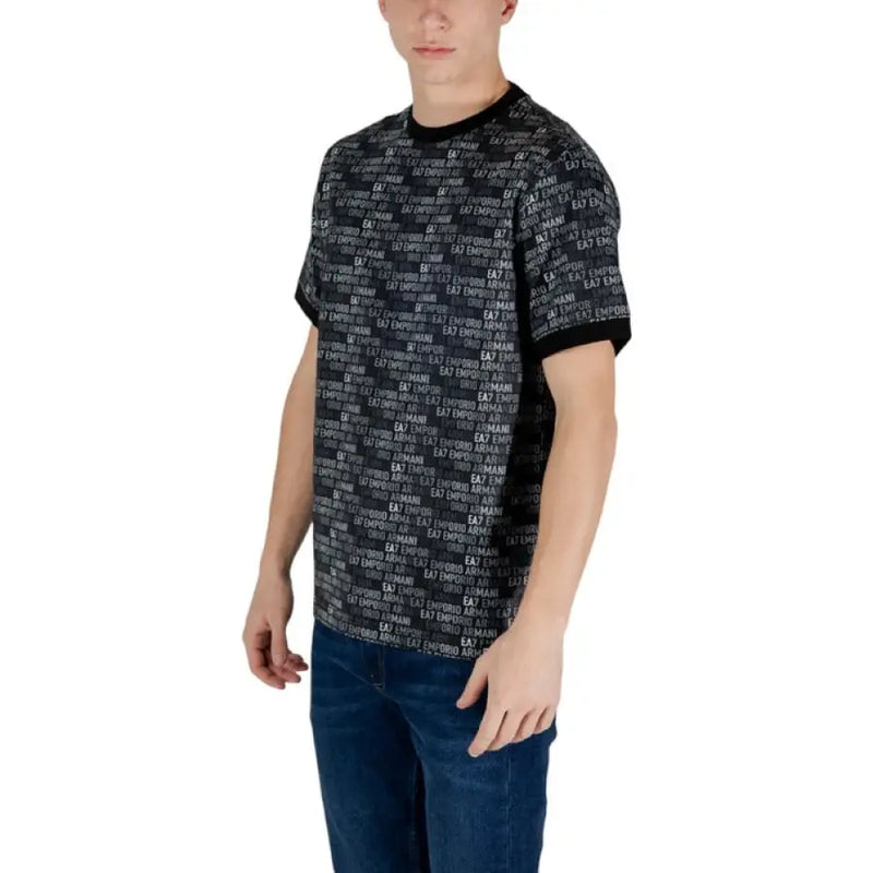 Man in Ea7 Black Print Cotton T-Shirt and jeans styled effortlessly
