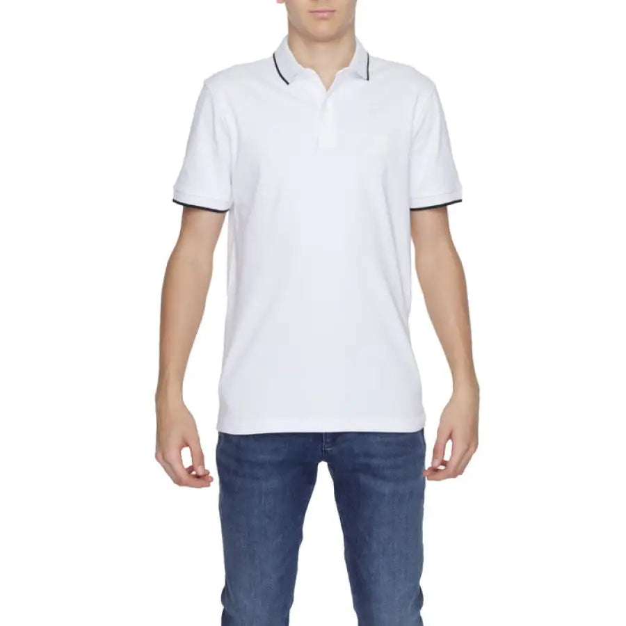 
                      
                        Man in white Boss Polo showcasing urban city style clothing
                      
                    