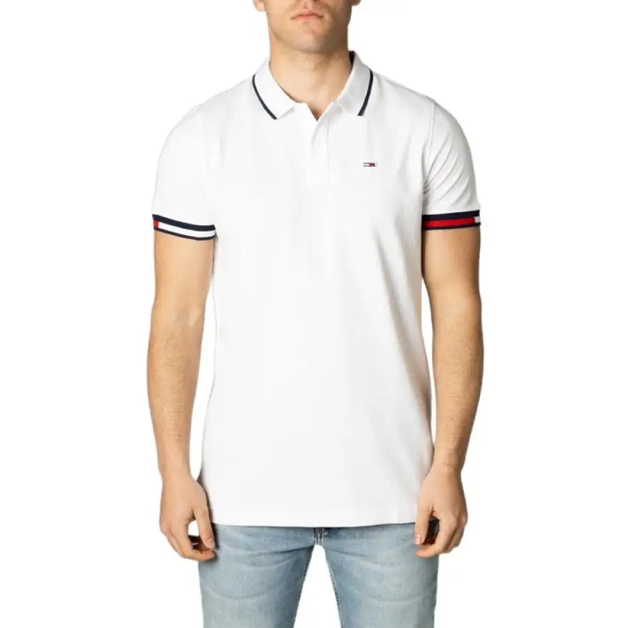 Man in Tommy Hilfiger Jeans white polo shirt with red and blue stripe