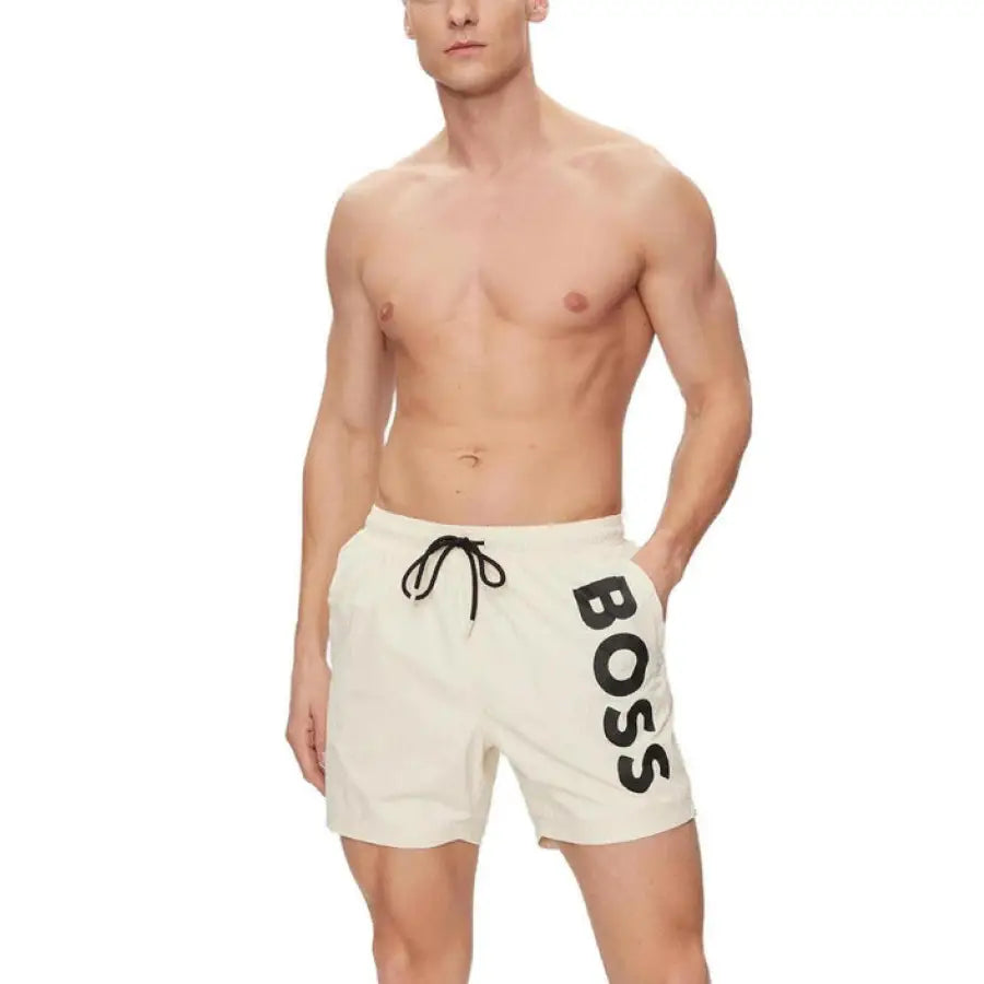 
                      
                        Boss men swimwear featuring boss boss men in white shorts labeled ’boss’
                      
                    