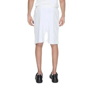 Man modeling Icon Men Shorts for urban city style fashion