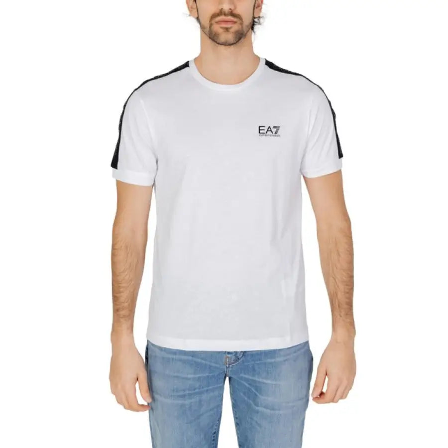 
                      
                        Ea7 Ea7 Men T-Shirt featuring man in white with black detailing
                      
                    