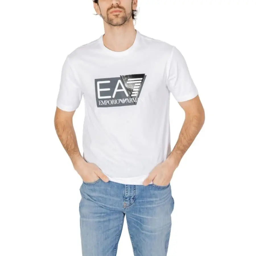 Man in EA7 men t-shirt displaying the EA logo, perfect for EA7 EA7 collection enthusiasts.