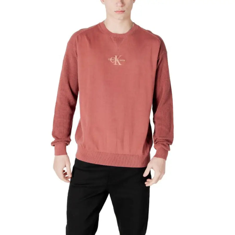 Maroon crewneck sweatshirt from Calvin Klein Jeans for men, featuring a round neck design