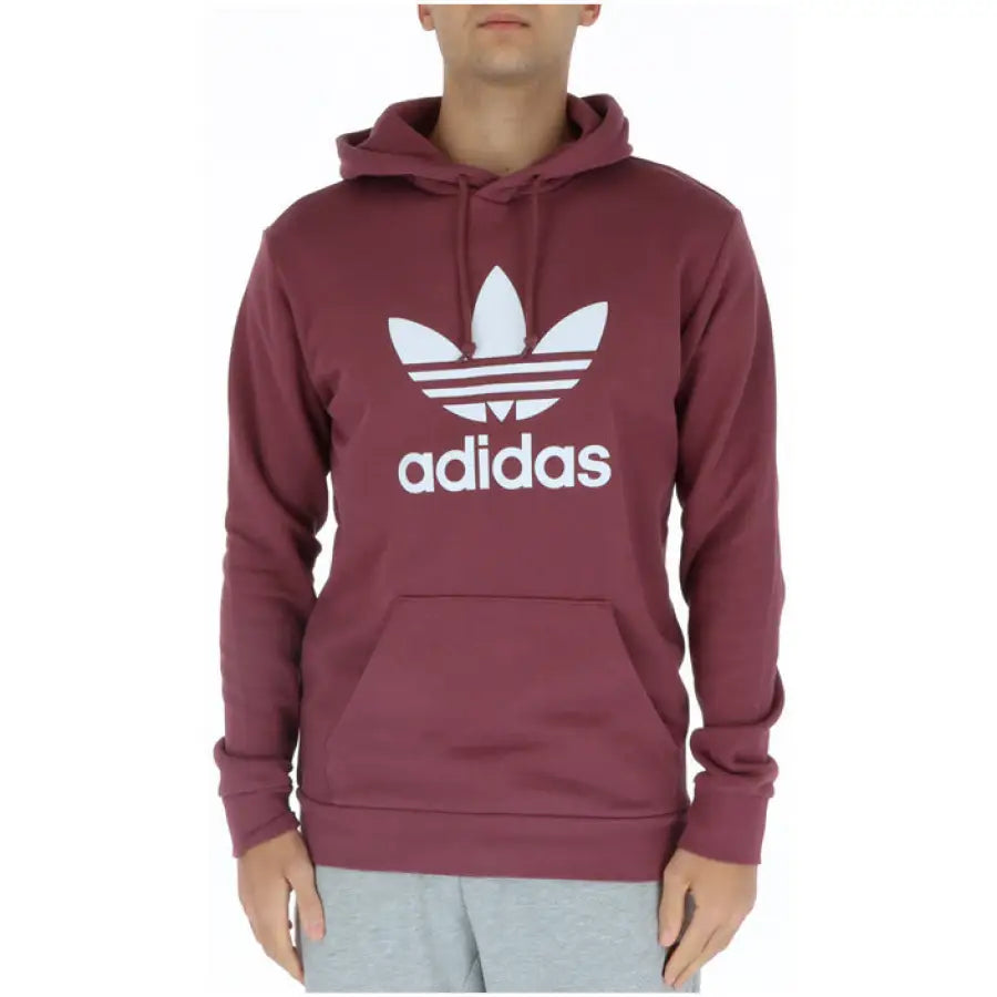 Maroon Adidas hoodie featuring logo, perfect for urban city style clothing