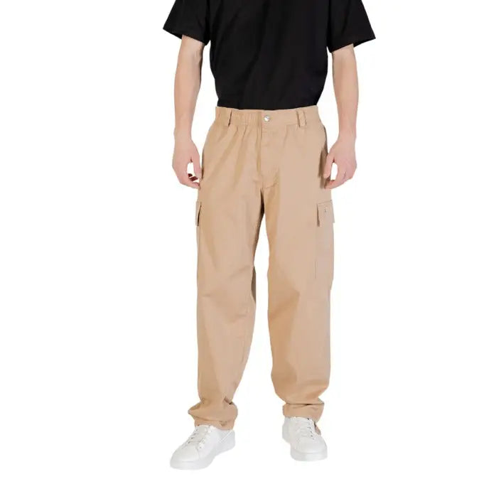 Mens light blue shirt paired with tan cargo pants shown in the product display