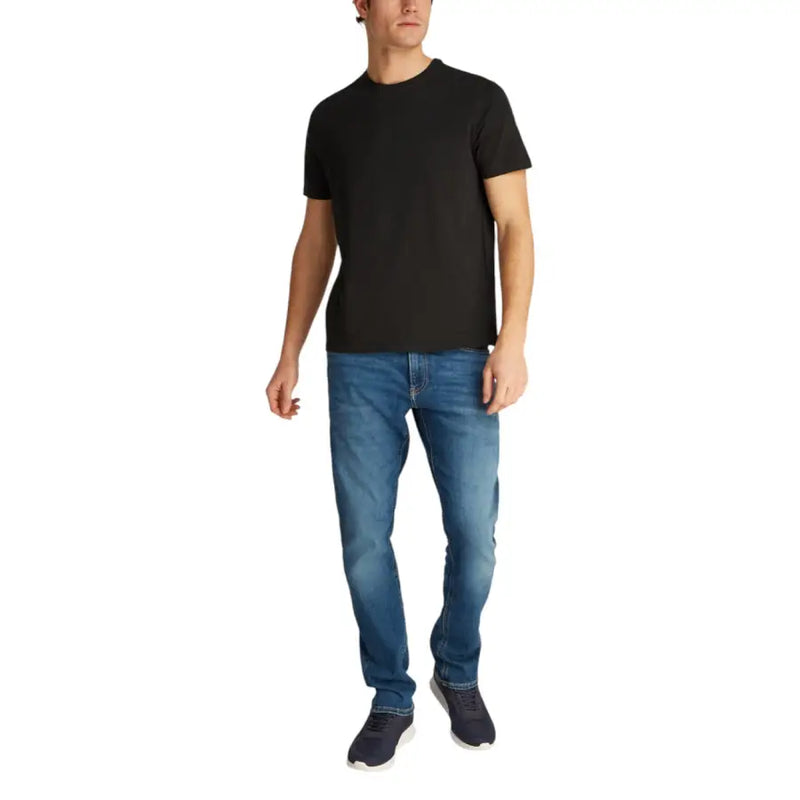Mens black short sleeve t shirt featuring a crew neck and soft cotton fabric suitable for casual wear