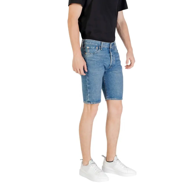 Men’s Levis® blue denim shorts with classic five-pocket design and frayed hem for casual wear