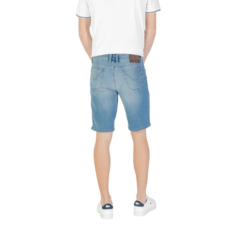 Men’s light blue denim shorts with a classic five-pocket design and brown leather brand patch at the waistband