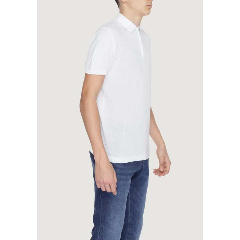 Men’s white polo shirt with short sleeves, classic collar, and neat stitching in breathable cotton material