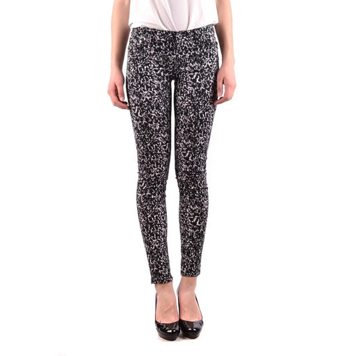 Jean skinny en coton stretch noir pour femme Michael Kors, orné d'un motif moucheté noir et blanc.