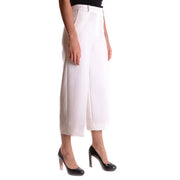 White high-waisted crop trousers by Michael Kors with a zip button closure and stretch tailored design
