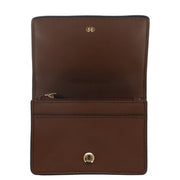 Michael Kors women wallet in beige brown leather with gold-tone hardware and a zipper pocket 10.5x8x3 cm