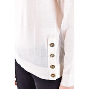 White michael kors button-up blouse with gold-tone mk logo buttons under wool turtleneck sweater for women