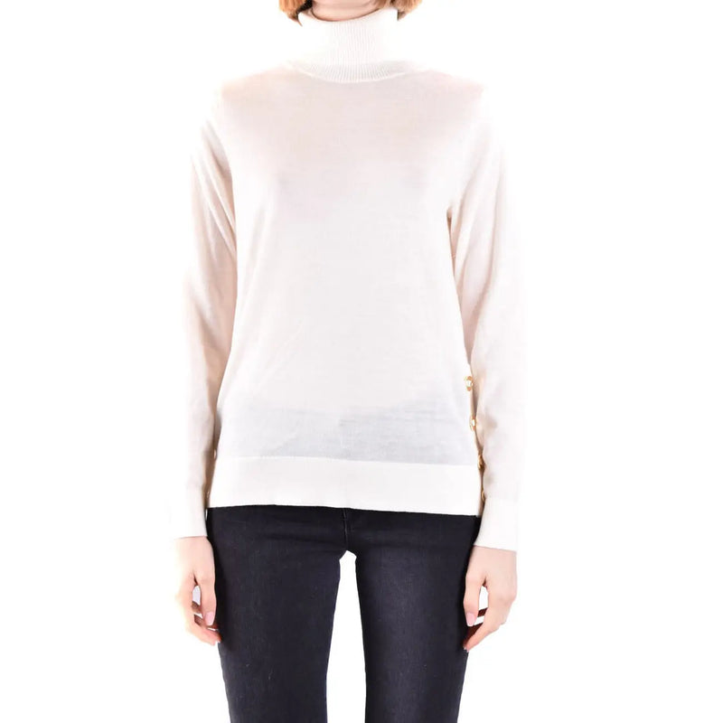 Michael Kors women wool turtleneck sweater in off-white with subtle sheen and gold-tone button detailing on the side seam