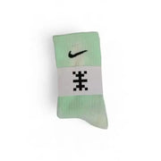 Mint green Nike athletic sock with pixelated design on ankle band, Nike Men Underwear