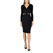 Women’s black long-sleeve wrap dress with gold buckle details and V-neck at Morgan De Toi