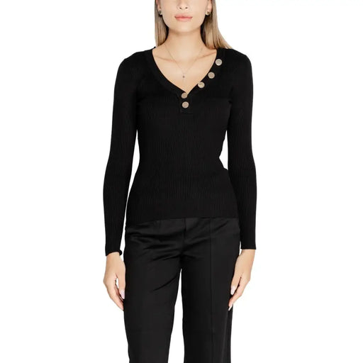 Women’s black ribbed long-sleeve V-neck knitwear with decorative gold buttons