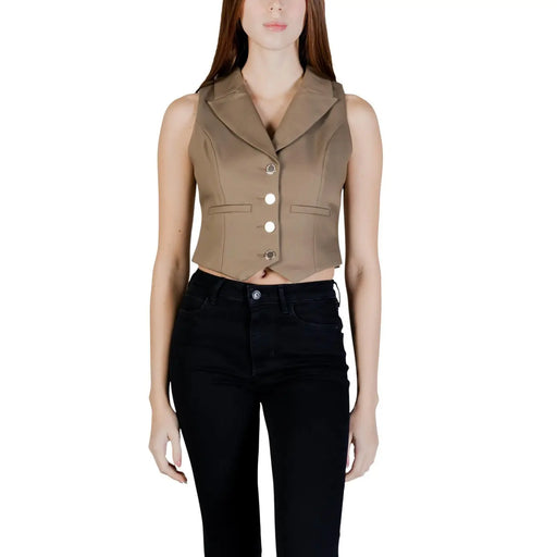 Tan sleeveless cropped vest with notched collar and three silver buttons down front in cotton by Morgan De Toi