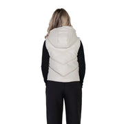 Cream-colored quilted sleeveless zip hooded gilet by Morgan De Toi with a sleek modern design
