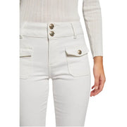 White high-waisted Morgan de toi jeans with gold-toned buttons paired with a ribbed knit top for spring summer