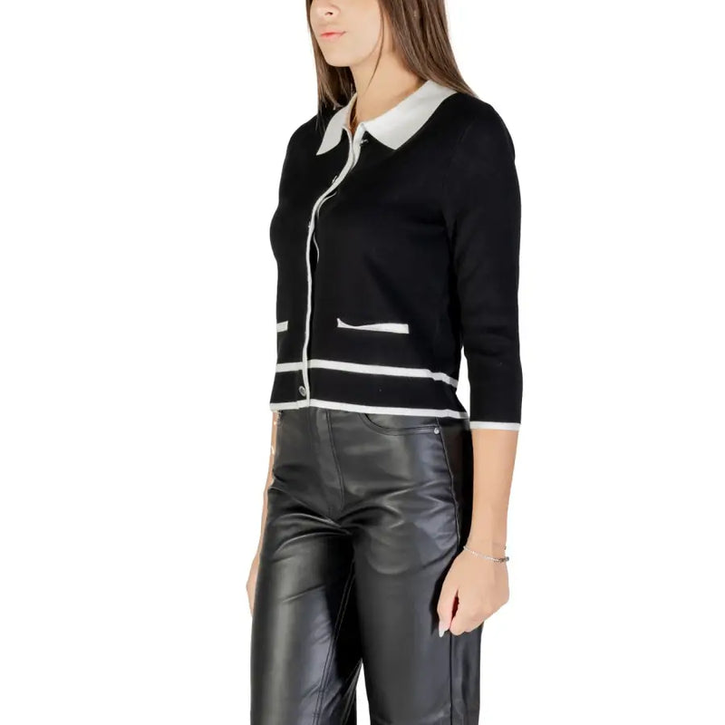 Morgan De Toi women black knit button front cardigan with white collar trim and pocket accents in three quarter sleeves
