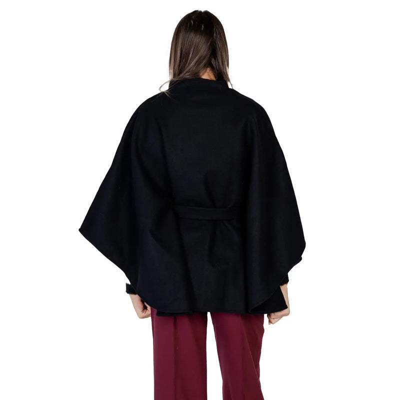 Morgan de toi women black wool blend cape with belted waist and wide flowing sleeves, shown from the back side