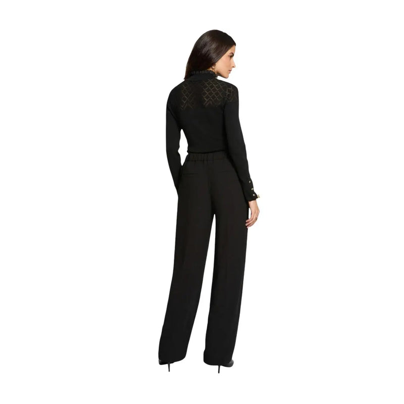Back view of morgan de toi women black polyester jumpsuit with sheer lace detailing high neckline and wide-leg pants