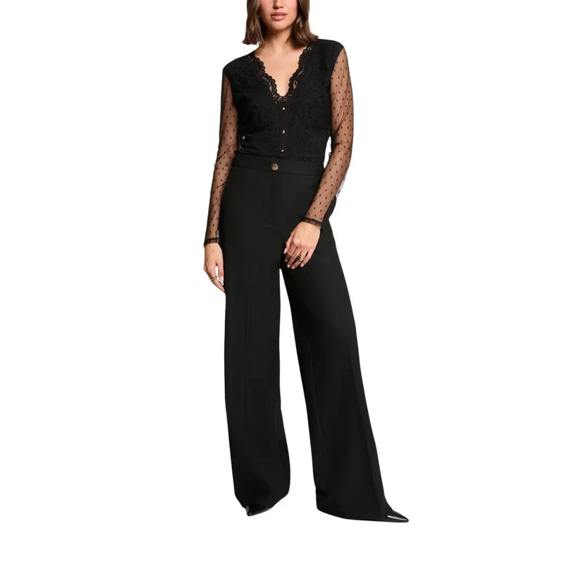 Morgan De Toi women black v neck blouse with black lace trim, sheer polka-dot long sleeves, and matching wide-leg trousers