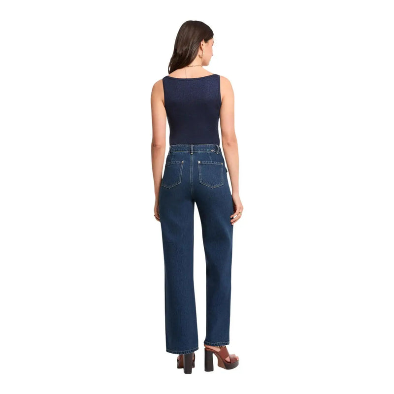 Dark blue high-waisted wide-leg denim jeans showing classic back pocket design paired with morgan de toi blue viscose top