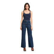 Dark blue high-waisted denim jeans with front pockets and flared legs paired with morgan de toi blue viscose top