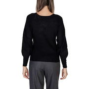 Women’s black long-sleeve knit top with puffed shoulders from Morgan De Toi