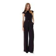 Morgan De Toi women sleeveless round neck black top with lace trim paired with wide-leg black trousers