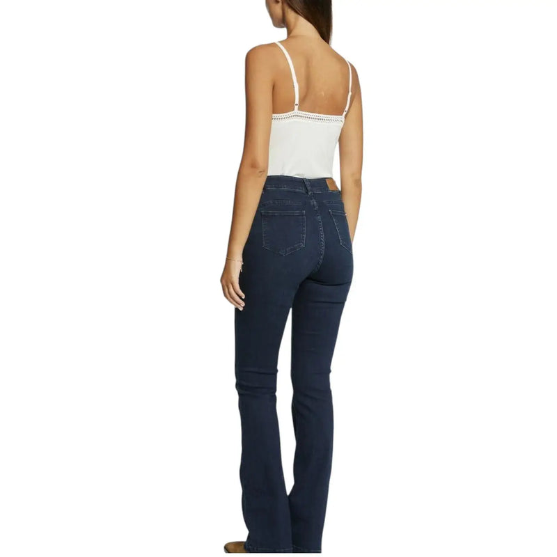 Dark blue denim flare jeans with high waist and subtle stitching paired with Morgan De Toi white viscose tank top