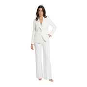 White tailored blazer with single button closure paired with Morgan De Toi women trousers white zip front pockets