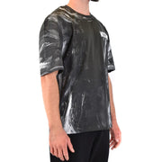 Moschino men t-shirt with black and white abstract paint-splatter pattern and logo on the chest, short-sleeve design