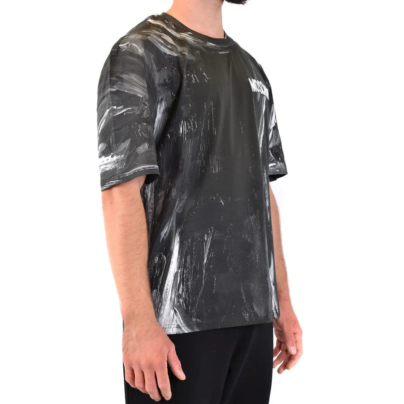 Moschino men t-shirt with black and white abstract paint-splatter pattern and logo on the chest, short-sleeve design